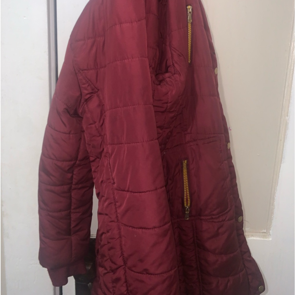 I’m selling a red coat size 10/12